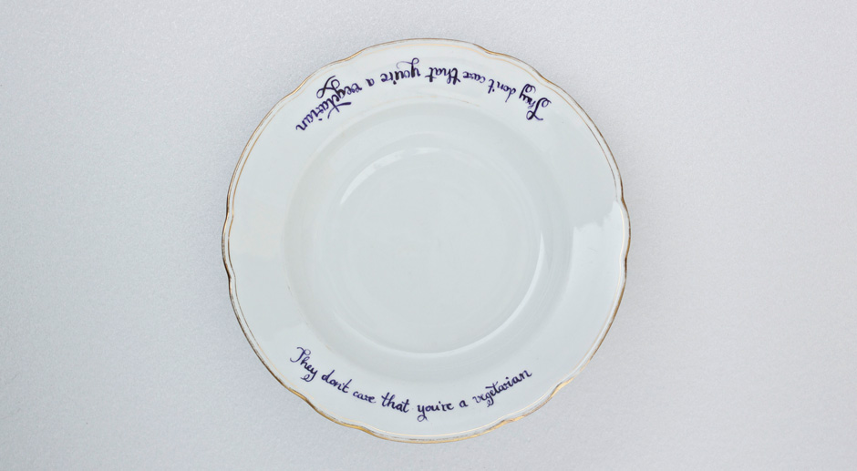 They don’t care that you’re a vegetarian. Delicate white plate with handwritten blue calligraphy and triple gold trim on bavarian porcelain.